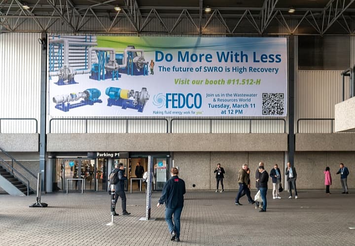 Banner Entrance C Fedco A banner with branding from FEDCO located between column near entrance C.