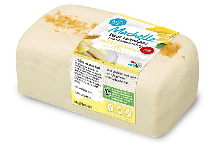Packshot van een blok verse roomkaas met citroen, Machelle Lemon Cheesecake van Lebo, met zichtbaar etiket